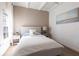 Bright bedroom featuring modern decor, a comfortable bed, and an airy ambiance at 4822 Hamlets Grove Dr, Sarasota, FL 34235