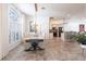 Dining area showcases an open layout flowing into the kitchen and living space, bathed in natural light at 4822 Hamlets Grove Dr, Sarasota, FL 34235