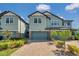 Charming townhouse with neutral siding, paver driveway, and well-maintained landscaping at 4828 San Martino Dr, Wesley Chapel, FL 33543