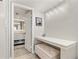 Ensuite bath area featuring storage and ample lighting at 4900 Brittany S Dr # 811, St Petersburg, FL 33715