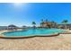 Community pool features beautiful water views, lounge chairs, and lush landscaping at 4900 Brittany S Dr # 811, St Petersburg, FL 33715