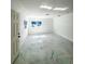 A clean, airy bedroom with bright marble-patterned floors and natural light at 547 16Th S Ave, St Petersburg, FL 33701