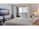 Bright bedroom with water view, comfortable bed, and plenty of natural light at 6287 Bahia Del Mar Cir # 801, St Petersburg, FL 33715