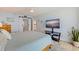 Light and airy bedroom with updated flooring, flat screen tv, and closet at 6287 Bahia Del Mar Cir # 801, St Petersburg, FL 33715