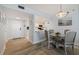 Cozy dining area adjacent to an open kitchen, perfect for casual dining and entertaining at 6287 Bahia Del Mar Cir # 801, St Petersburg, FL 33715