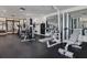 Community gym with free weights, weight machines, and a mirrored wall at 6287 Bahia Del Mar Cir # 801, St Petersburg, FL 33715