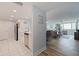 Open concept living area with modern finishes and scenic views through large windows at 6287 Bahia Del Mar Cir # 801, St Petersburg, FL 33715