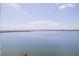 Stunning waterfront view with a bridge in the distance under a bright sky at 6287 Bahia Del Mar Cir # 801, St Petersburg, FL 33715