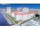 Aerial view of bayside apartments with boat docks on the water and a red tile roof at 700 S Harbour Island Blvd # 342, Tampa, FL 33602