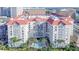 Upscale condo complex featuring a central pool, palm trees, and views of the city skyline, offering a luxurious lifestyle at 700 S Harbour Island Blvd # 342, Tampa, FL 33602