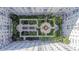 Birds eye view of the building's courtyard, with pathways, landscaping, a fountain, and sitting areas at 700 S Harbour Island Blvd # 342, Tampa, FL 33602