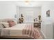 Charming bedroom featuring plush carpeting, a ceiling fan, and a sunny window seat for relaxation at 700 S Harbour Island Blvd # 342, Tampa, FL 33602