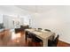 Open-concept dining area with wood floors, looking into the living room at 700 S Harbour Island Blvd # 342, Tampa, FL 33602