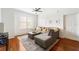 Inviting living room with hardwood floors, a plush sectional sofa, and plenty of natural light from the large window at 700 S Harbour Island Blvd # 342, Tampa, FL 33602