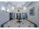 Elegant lobby featuring a decorative chandelier, tile flooring, and paneled walls at 700 S Harbour Island Blvd # 342, Tampa, FL 33602