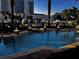 Beautiful pool with palm trees and a cityscape view in the background at 700 S Harbour Island Blvd # 342, Tampa, FL 33602