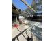 Outdoor pool requires cleaning and maintenance with surrounding enclosure and patio area at 7421 Mulligan Ct, Port Richey, FL 34668