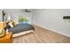 Spacious bedroom with ceiling fan and sliders to the backyard pool area at 833 Lakeside Ter, Palm Harbor, FL 34683