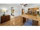 Home office features hardwood floors, built-in shelving, and a desk space at 833 Lakeside Ter, Palm Harbor, FL 34683