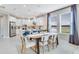 A modern kitchen with stainless steel appliances view from the dining area at 845 Steel Dr, Apollo Beach, FL 33572