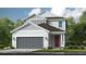 Two-story home with gray accents, gray garage door, a red front door, and manicured front lawn at 845 Steel Dr, Apollo Beach, FL 33572