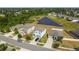 Aerial view of homes with a pond nearby in a serene neighborhood at 10013 Caraway Spice Ave, Riverview, FL 33578