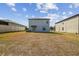 Large backyard features ample green space, perfect for outdoor activities at 10013 Caraway Spice Ave, Riverview, FL 33578