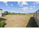 A spacious backyard provides ample room for outdoor activities and relaxation at 10013 Caraway Spice Ave, Riverview, FL 33578