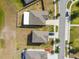 Avelar Creek home exteriors boast well-maintained roofs and landscaping, with street views of driveways and manicured lawns at 10013 Caraway Spice Ave, Riverview, FL 33578