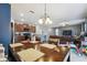 Open concept living space combining the kitchen, dining, and living room areas for a modern feel at 10013 Caraway Spice Ave, Riverview, FL 33578