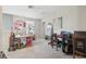 Upstairs living area with multiple desks, an office space, and comfortable seating, a versatile layout at 10013 Caraway Spice Ave, Riverview, FL 33578