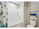 Bathtub with shower and colorful shower curtain at 10148 Rose Petal Pl, Riverview, FL 33578