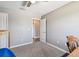 Bedroom featuring carpet, a ceiling fan, and neutral paint at 10148 Rose Petal Pl, Riverview, FL 33578