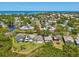 Charming waterfront home in a picturesque community, offering a peaceful setting and a view of the lake at 1015 S Pointe Alexis Dr, Tarpon Springs, FL 34689