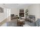 Bright living room with tile floors, fireplace, and stylish furnishings, creating a cozy and inviting atmosphere at 11205 Tralee Dr, Riverview, FL 33569