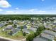 Aerial view of a residential community featuring well-maintained lawns and mature landscaping at 11220 Godwit Ct, New Port Richey, FL 34654