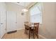 Cozy breakfast nook with natural light and seating for two at 11220 Godwit Ct, New Port Richey, FL 34654