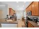 Bright kitchen showcasing modern appliances and a cozy breakfast nook at 11220 Godwit Ct, New Port Richey, FL 34654