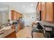 Spacious kitchen with stainless steel appliances and ample counter space at 11220 Godwit Ct, New Port Richey, FL 34654