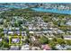 Aerial view of neighborhood and property surrounded by lush greenery at 12021 144Th St, Largo, FL 33774