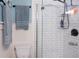 Bright bathroom featuring a modern glass shower and soft, plush towels at 12021 144Th St, Largo, FL 33774