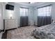 Airy bedroom with soft lighting, patterned rug, and a decorative dresser at 12021 144Th St, Largo, FL 33774