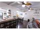 Cozy living room featuring a breakfast bar and hardwood floors at 12021 144Th St, Largo, FL 33774