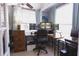 Comfortable office with multiple monitors, large windows, and a relaxing atmosphere at 12021 144Th St, Largo, FL 33774