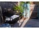Cozy patio with seating and lush plants, surrounded by a privacy fence at 12021 144Th St, Largo, FL 33774