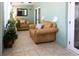 Relaxing sunroom with seating, plants, and natural light at 12021 144Th St, Largo, FL 33774