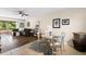 Inviting living room with a large window and sliding door, seamlessly blending indoor and outdoor living at 1250 S Pinellas Ave # 405, Tarpon Springs, FL 34689
