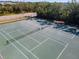 Aerial view of well-maintained community tennis courts at 1250 S Pinellas Ave # 405, Tarpon Springs, FL 34689