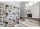 Bright bathroom features a vanity with sink and decorative, unique shower curtain at 12790 118Th St, Seminole, FL 33778