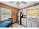 Kitchen features tile floors, stainless steel refrigerator, and neutral walls at 12790 118Th St, Seminole, FL 33778